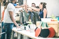 Young employee startup workers group stacking hands at office