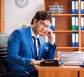 Young employee working in the office Royalty Free Stock Photo