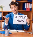 Young employee working in the office Royalty Free Stock Photo