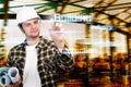 Young engineer, Architect, businessman pointing at building and construction concept