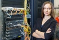 Young engineer and businesswoman at the network equipment