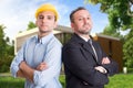 Young engineer and entepreneur in front of house Royalty Free Stock Photo