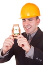 Young engineer with hourglass Royalty Free Stock Photo