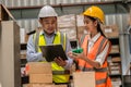 Young engineer woman worker working with senior training job happy difference generation working together Royalty Free Stock Photo