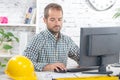 Young engineer working on his computer