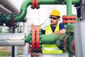 Engineer working inside oil and gas refinery Royalty Free Stock Photo