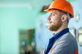 Young engineer at workplace in factory