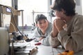 Young engineering students using a 3D printer Royalty Free Stock Photo