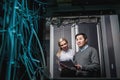 Young engineers businessmen in server room Royalty Free Stock Photo