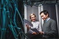 Young engineers businessmen in server room Royalty Free Stock Photo