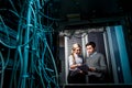 Young engineers businessmen in server room