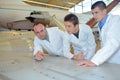 young engineers check aircraft systems
