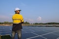 Young engineers who are expert in solar power generation systems, alternative electricity source, concept of sustainable resources