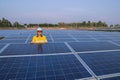 Young engineers who are expert in solar power generation systems, alternative electricity source, concept of sustainable resources