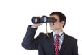 Young entrepreneur peers through binoculars