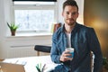 Young entrepreneur sitting in his office