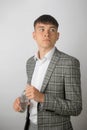 Young entrepreneur wearing a suit jacket and open neck shirt Royalty Free Stock Photo