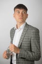 Young entrepreneur wearing a suit jacket and open neck shirt Royalty Free Stock Photo