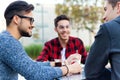 Young entrepreneurs working at coffee bar. Royalty Free Stock Photo