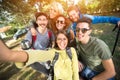 Young equip makes selfie in nature