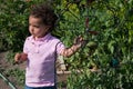 Young Ethnic Girl in Garden Royalty Free Stock Photo