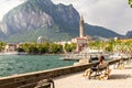 Young European couple admires view on the bay of lake Como and admire the main attractions of the city St. Nicholas di