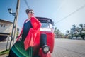 Young european girl woman red tuk tuk in Galle, traditional transport in Sri Lanka Royalty Free Stock Photo