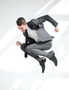 Full-length jump of a young man jumping with an open mouth, isolated on a white background. Royalty Free Stock Photo