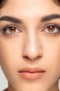 Close up portrait of beautiful jewish woman isolated on studio background. Beauty, fashion, skincare, cosmetics concept