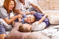 Young family being playful at home Royalty Free Stock Photo