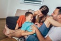 Young family being playful at home Royalty Free Stock Photo