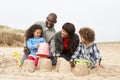 Young Family Building Sandcastle On Beach Holiday Royalty Free Stock Photo