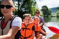 Young Family Canoeing Royalty Free Stock Photo