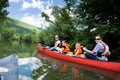 Young Family Canoeing Royalty Free Stock Photo