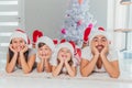 Young family celebrating Christmas at home.Happy young family enjoying their holiday time together Royalty Free Stock Photo