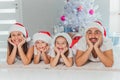 Young family celebrating Christmas at home.Happy young family enjoying their holiday time together Royalty Free Stock Photo