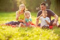 Family with children blow soap bubbles outdoor Royalty Free Stock Photo