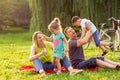 Young family with children having fun in nature Royalty Free Stock Photo