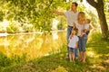 A young family with children in nature