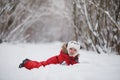 Young family with children are walking in the winter park. Winte Royalty Free Stock Photo