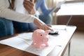 Young family couple managing financial monthly budget. Royalty Free Stock Photo