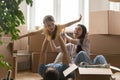 Young family with daughter celebrate moving day Royalty Free Stock Photo