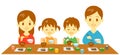 Young family at dinner, Japanese meal Royalty Free Stock Photo