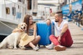 Young family with a dog preparing for the journey