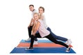 Young family doing stretching exercises Royalty Free Stock Photo