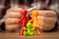 Young family first problems, colorful figurines on table with padlock. Conflict, crisis concept photo