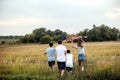 A young family flies a kite Royalty Free Stock Photo