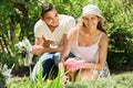 Young family gardening