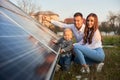 Young family getting to know alternative energy Royalty Free Stock Photo