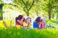 Young family with kids having picnic outdoors Royalty Free Stock Photo